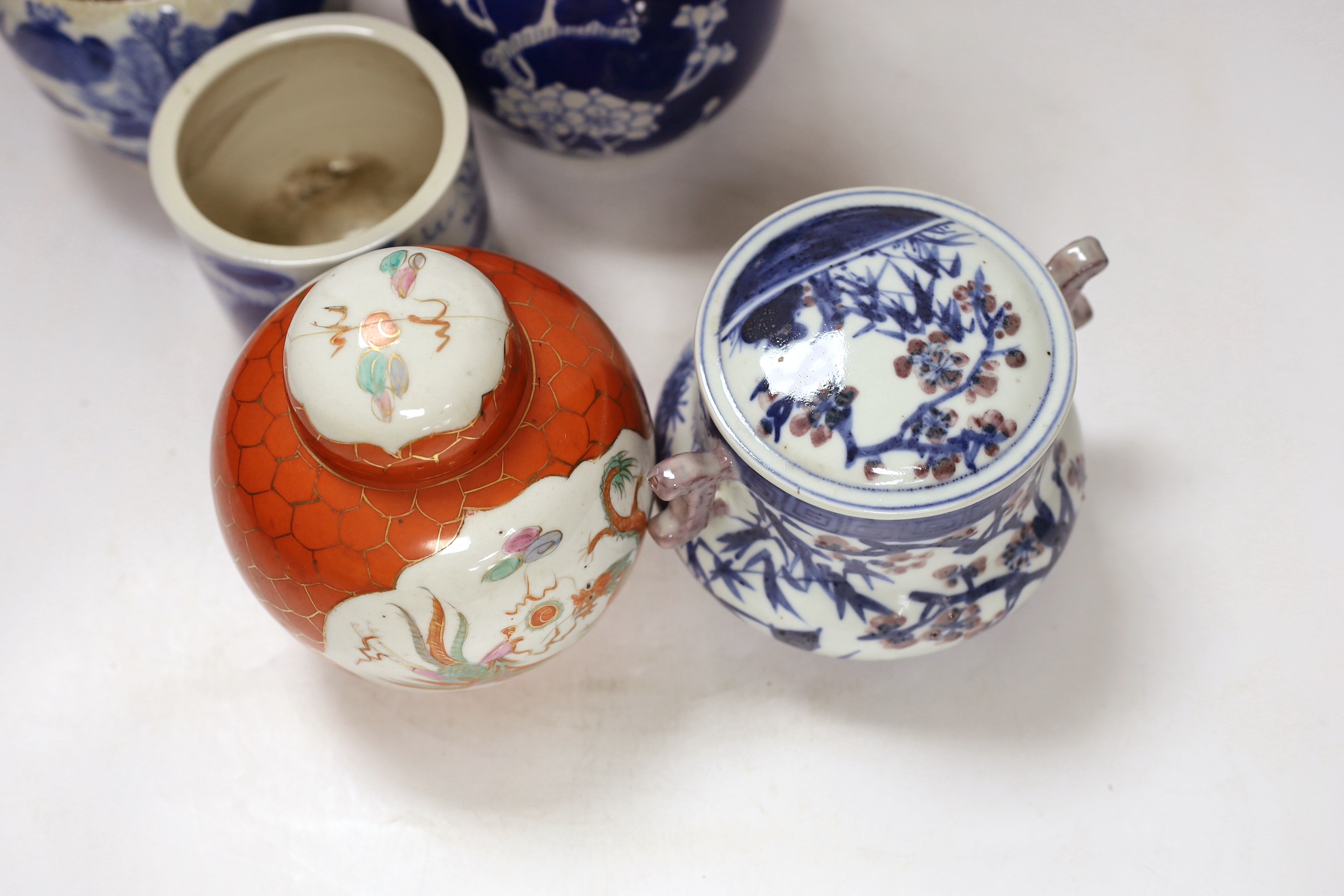 Two Chinese famille rose jars, a similar pot with cover, a brush pot and a vase, 18th century and later, tallest 24cm (5)